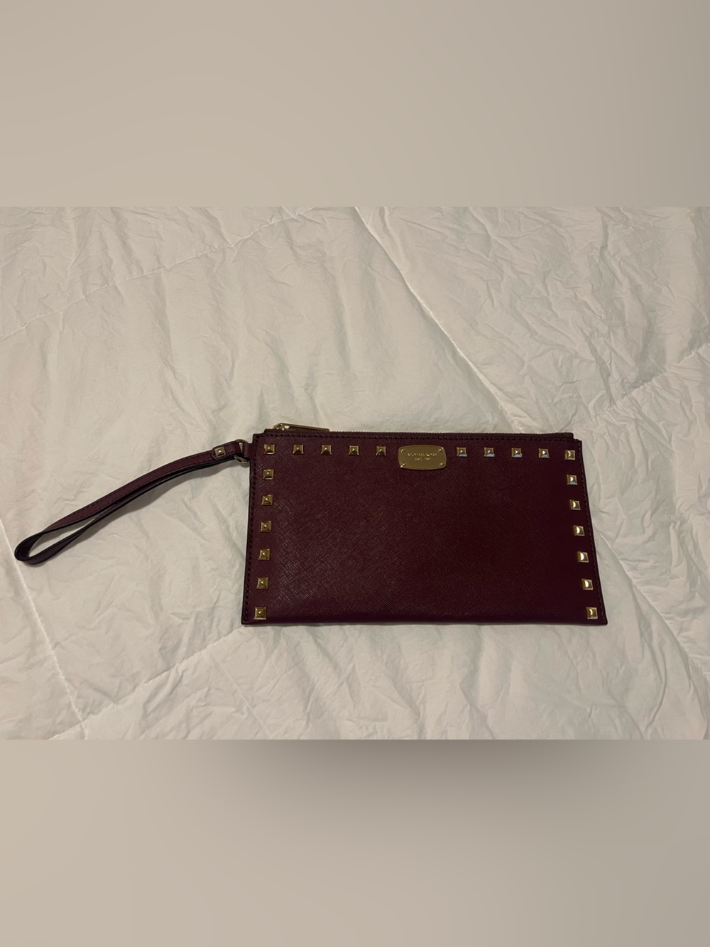MK Gold-Stud Plum Wristlet Clutch